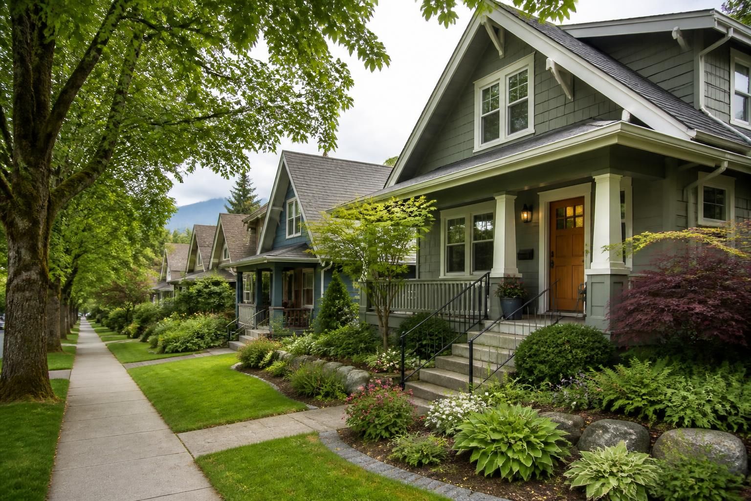 Tree-lined residential neighborhood with well-kept homes in the Pacific Northwest.